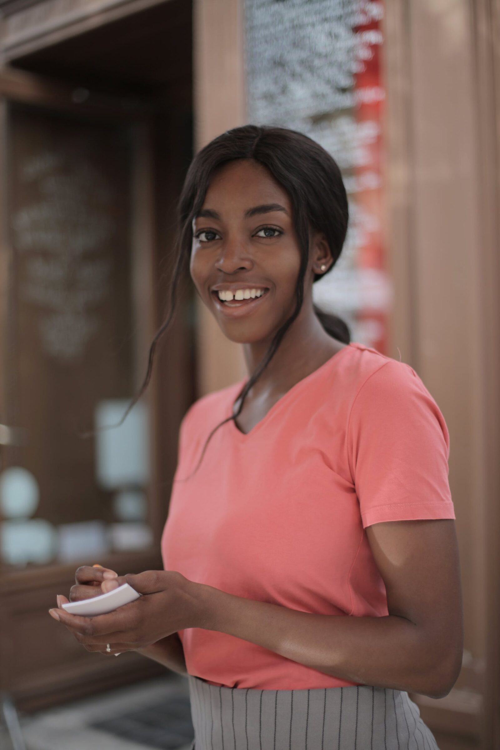 Smiling Waitress Taking an Order